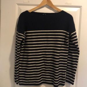 Slightly worn heavy knit navy and cream sweater.